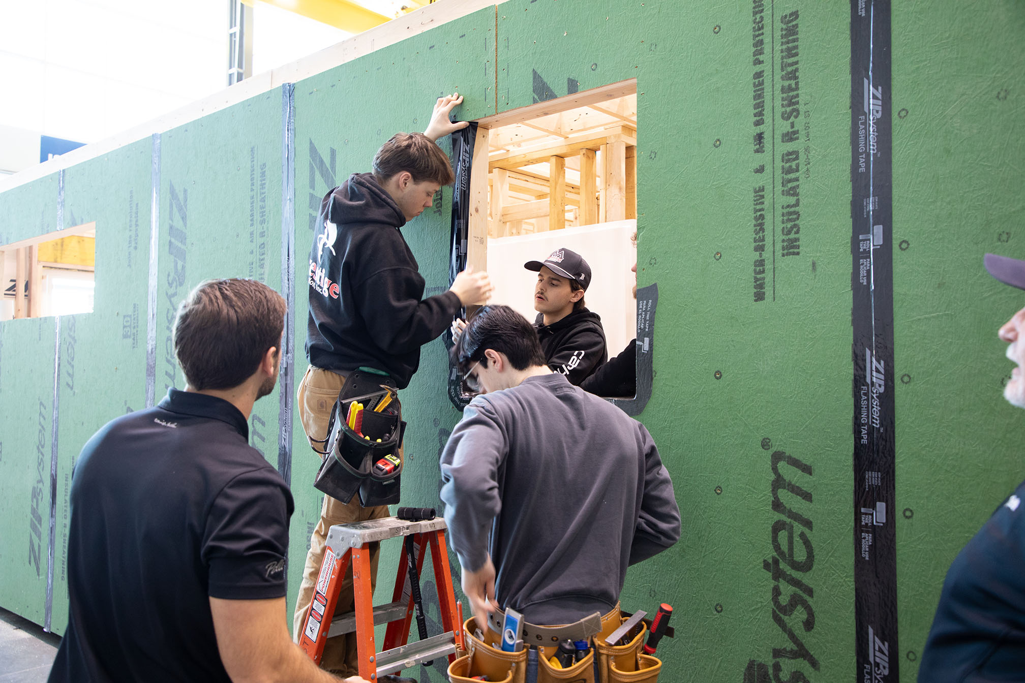 Students working on construction project